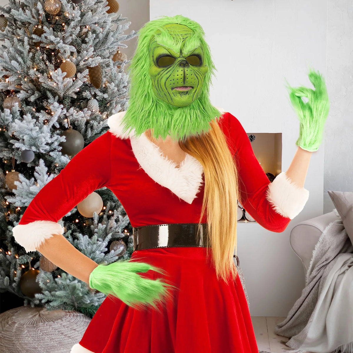The green mask and gloves appear in a Christmas room with a red outfit.
