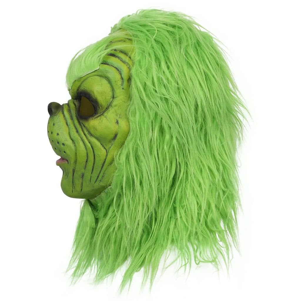 The green mask right profile shows its sculpted mouth and green hair.