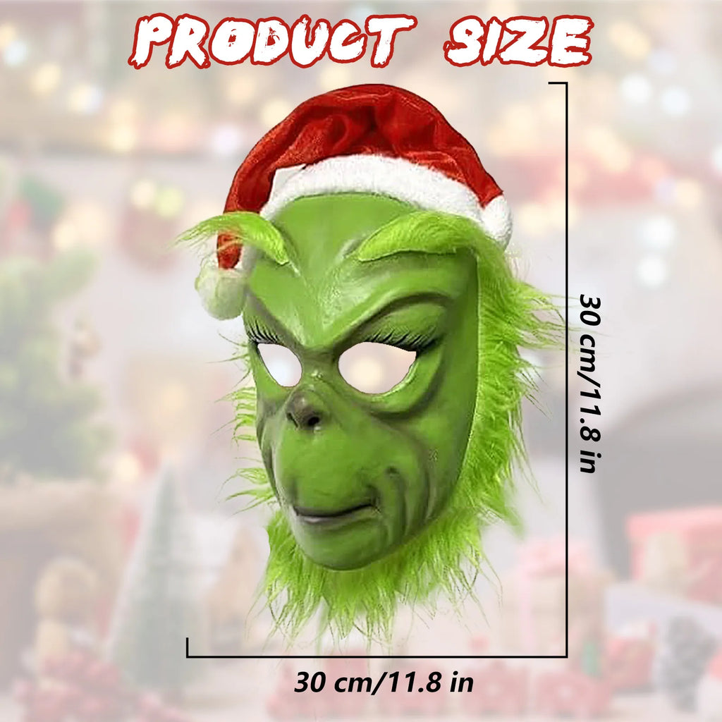 The green monster mask size graphic labels outside dimensions of 30 by 30 centimeters. The design has long lashes and a red hat.