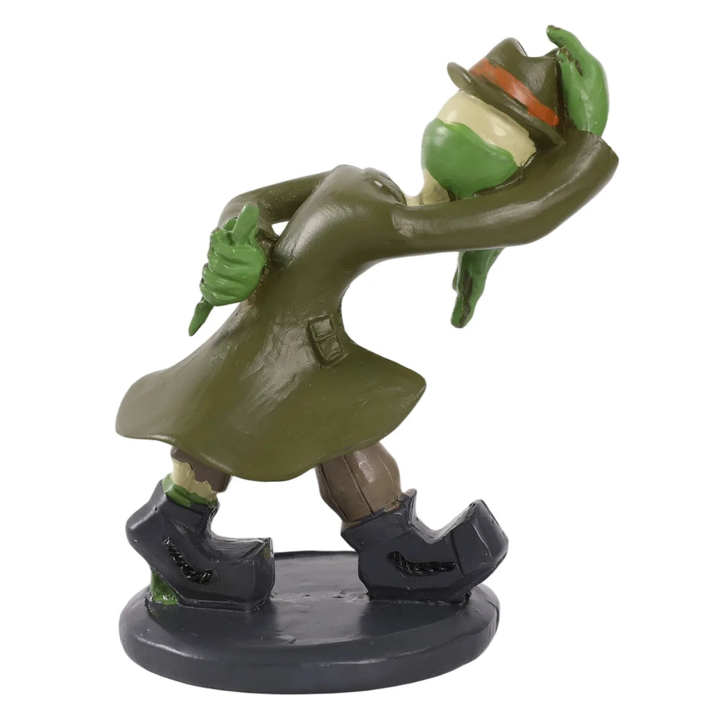 Side view shows the green monster figure wearing a long coat.