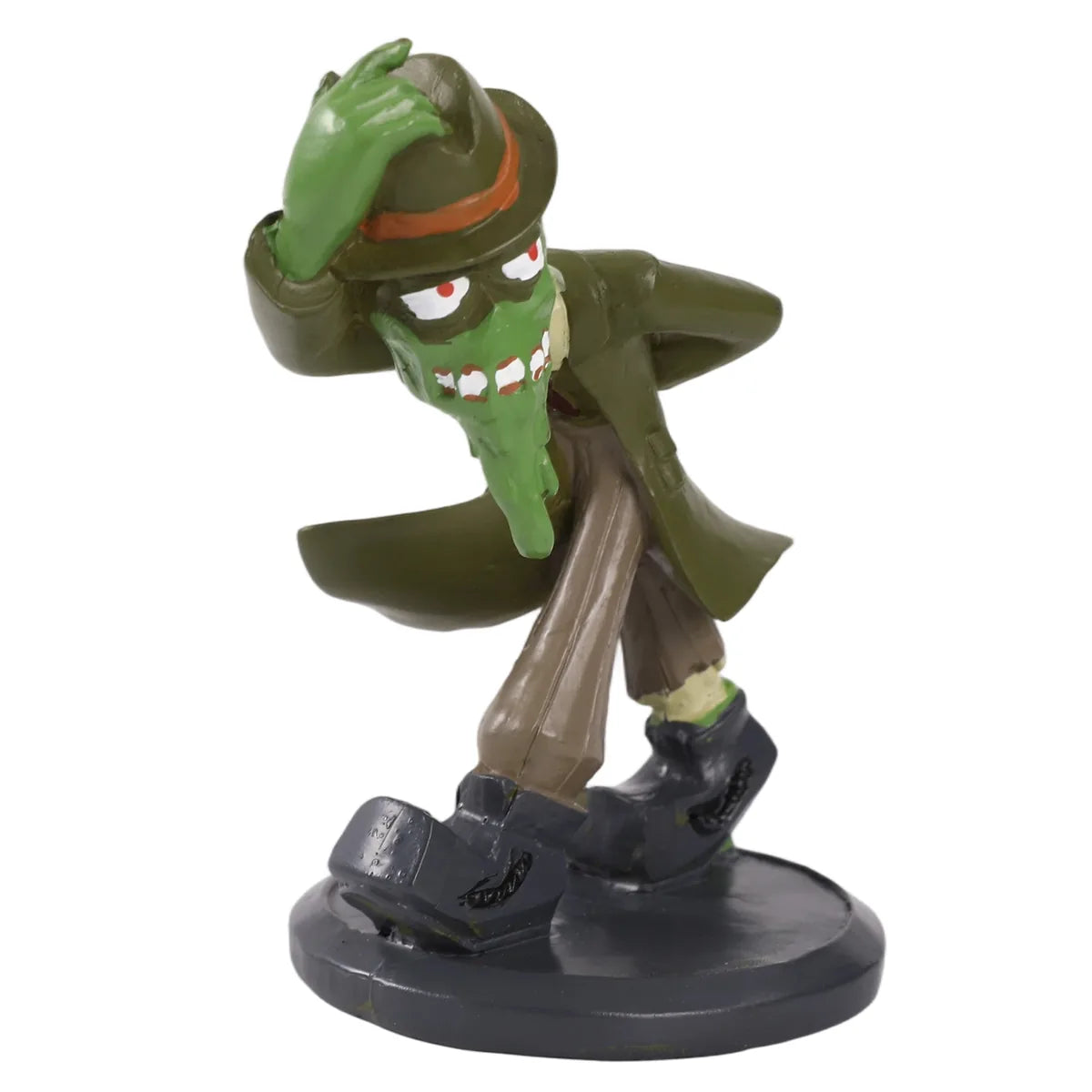 Three-quarter view shows the monster figurine tipping its brown hat.