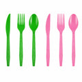 Green and pink disposable plastic cutlery set with knives, forks, and spoons for witch party, Halloween, birthday, and themed tableware.