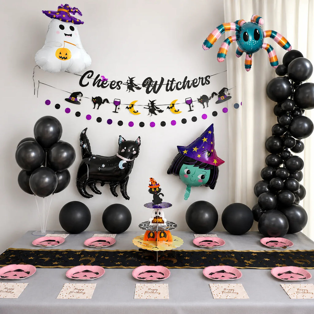 Halloween birthday party decorations set with little witch theme, black balloons, banner, pink pumpkin plates, cupcake stand and Halloween table setup