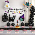 Halloween birthday party decorations set with little witch theme, black balloons, banner, pink pumpkin plates, cupcake stand and Halloween table setup