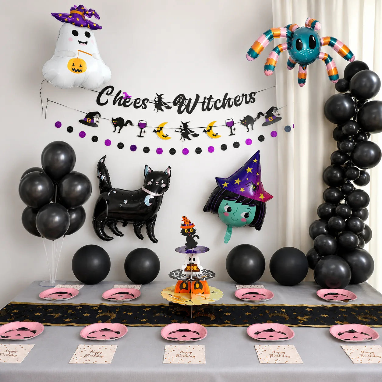 Halloween birthday party decorations set with little witch theme, black balloons, banner, pink pumpkin plates, cupcake stand and Halloween table setup