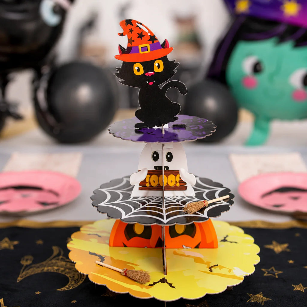 Halloween black cat pumpkin cupcake stand with ghost, spider web and mini witch broom details for a little witch birthday party