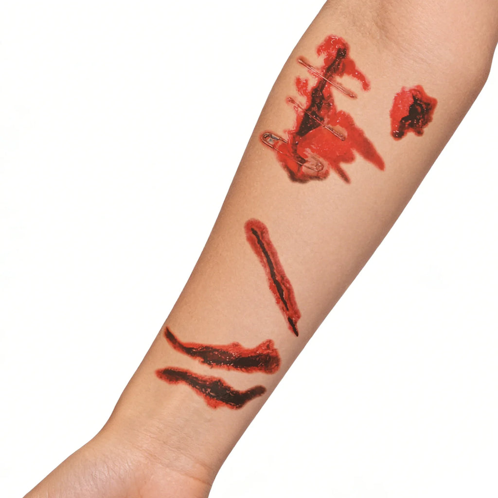Multiple-angle view of the halloween scar temporary tattoos 10 sheets, showing its shape from different sides.