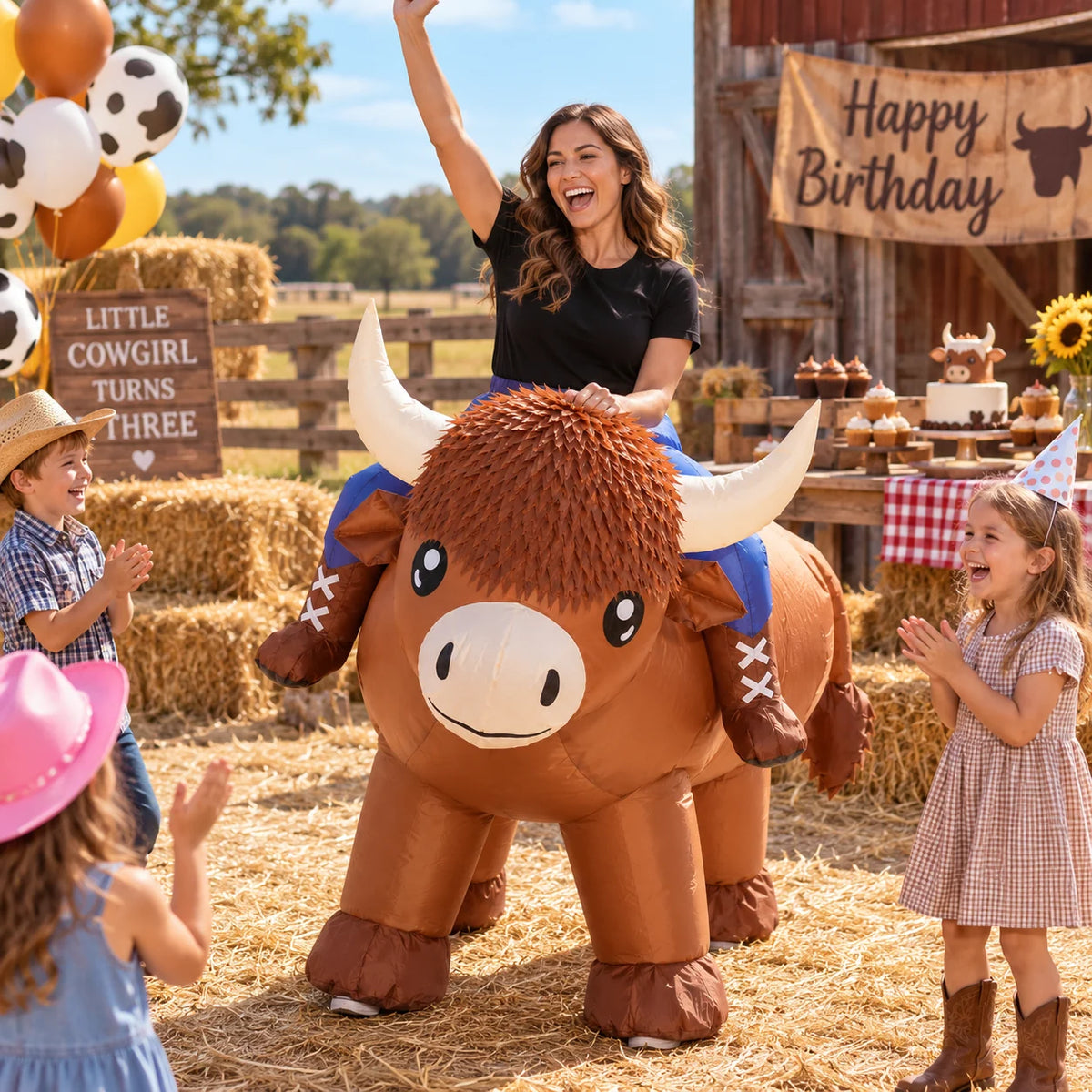Adult wearing a Highland cow inflatable costume at a children's farm birthday party.