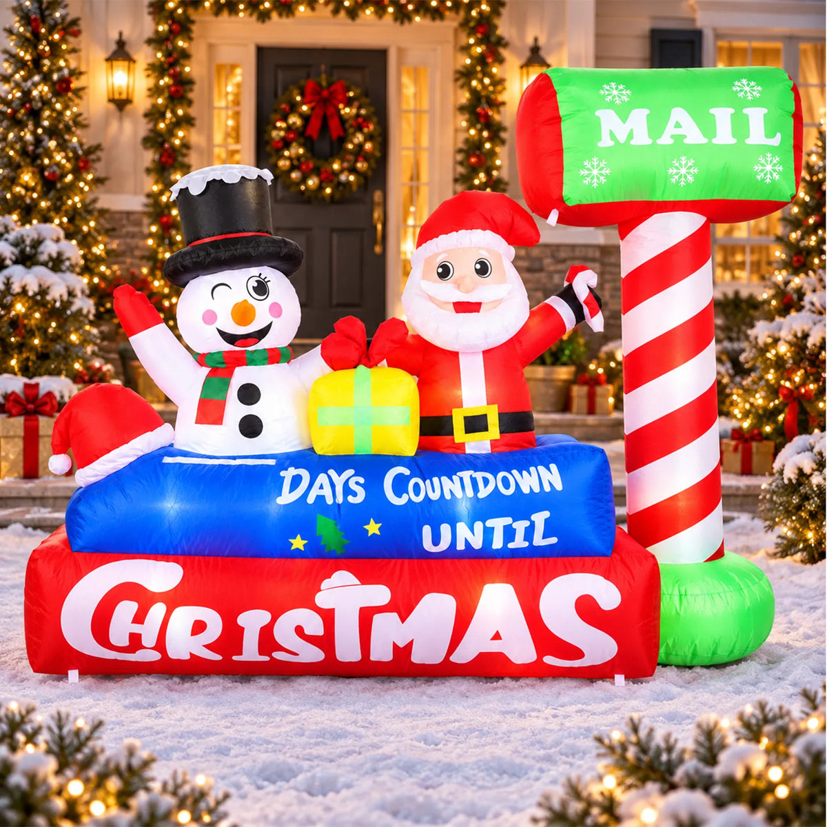 Inflatable Christmas mailbox countdown display arranged in a decorated front yard.
