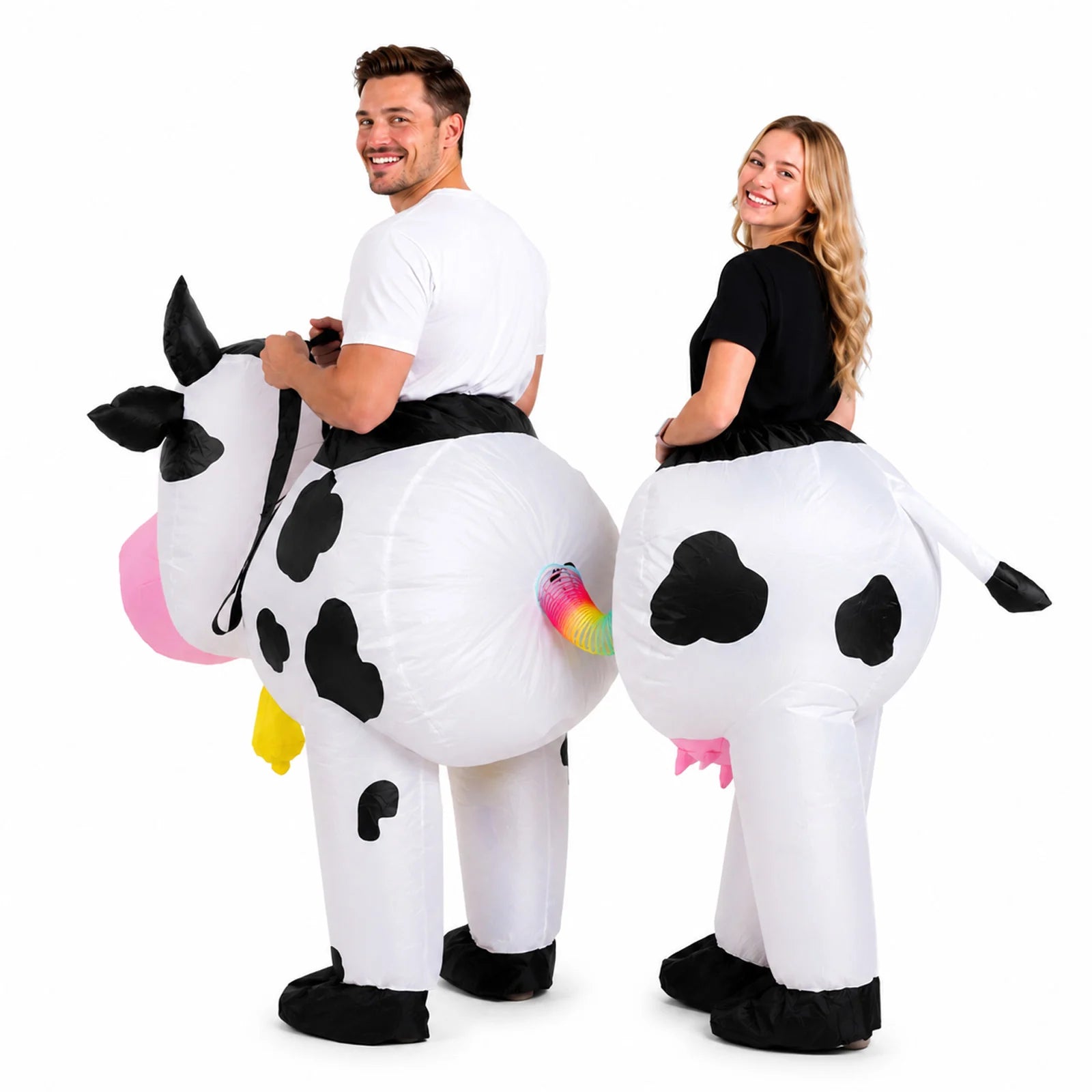 Side view shows two adults linked by the rainbow connector in the cow costume
