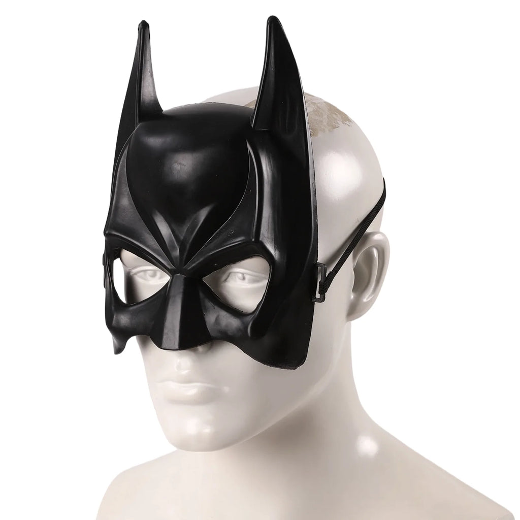 Multiple-angle view of the kids black bat half mask, showing its shape from different sides.