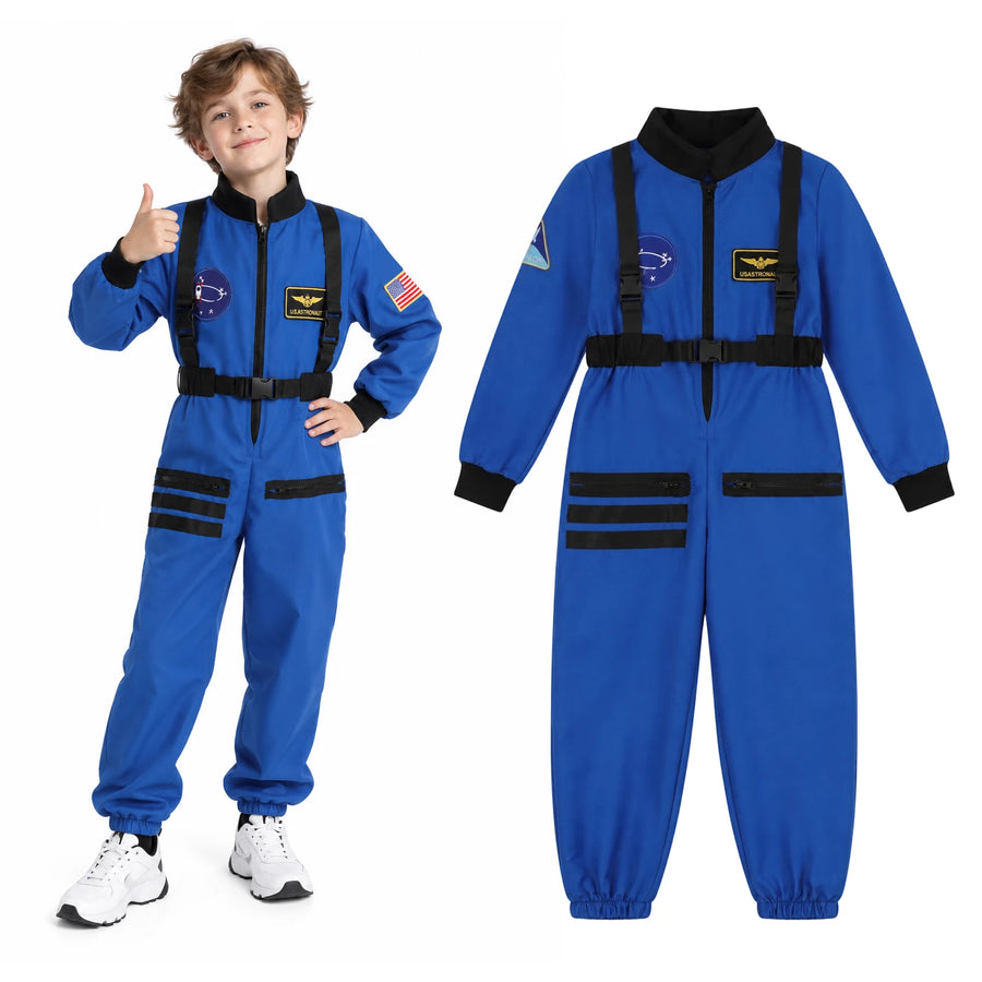 Child wearing a blue astronaut jumpsuit raises one thumb beside a separate garment with black straps and patches.