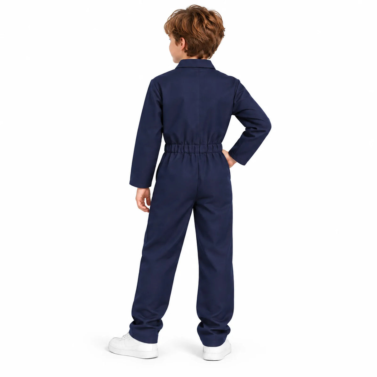 The back of a child wearing the navy coverall shows its gathered waist.