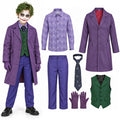 A child wears the purple suit costume beside its coat, shirt, vest, pants, tie and gloves.