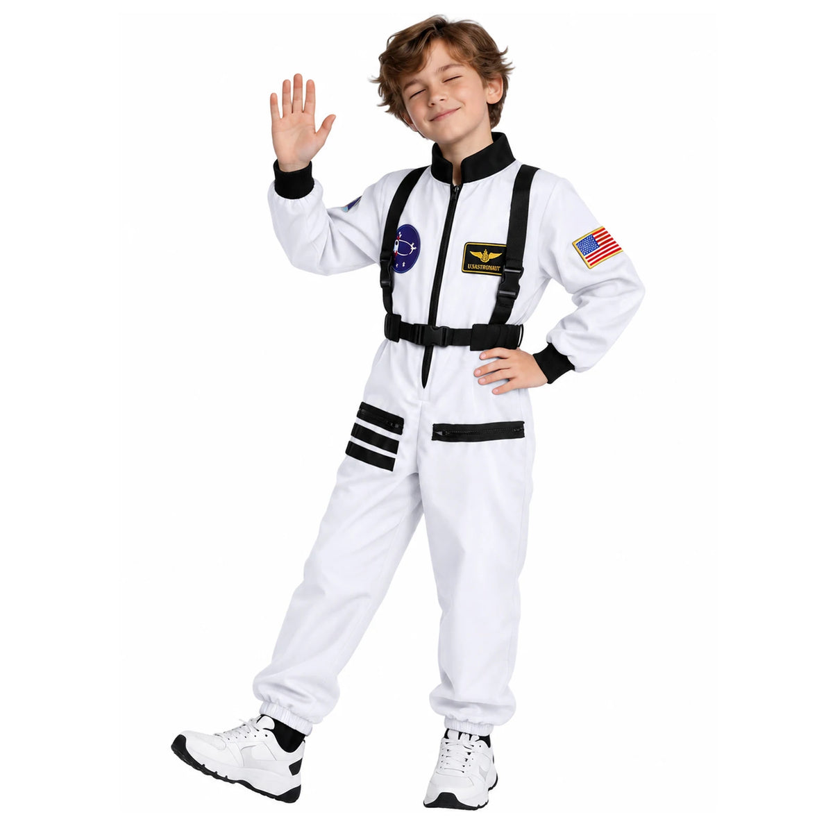Child wearing a white astronaut jumpsuit waves one hand showing black harness-style straps and space-themed chest patches.