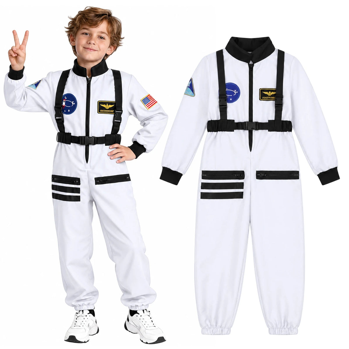 Child wearing a white astronaut jumpsuit raises two fingers beside the separate garment showing black trim and space patches.