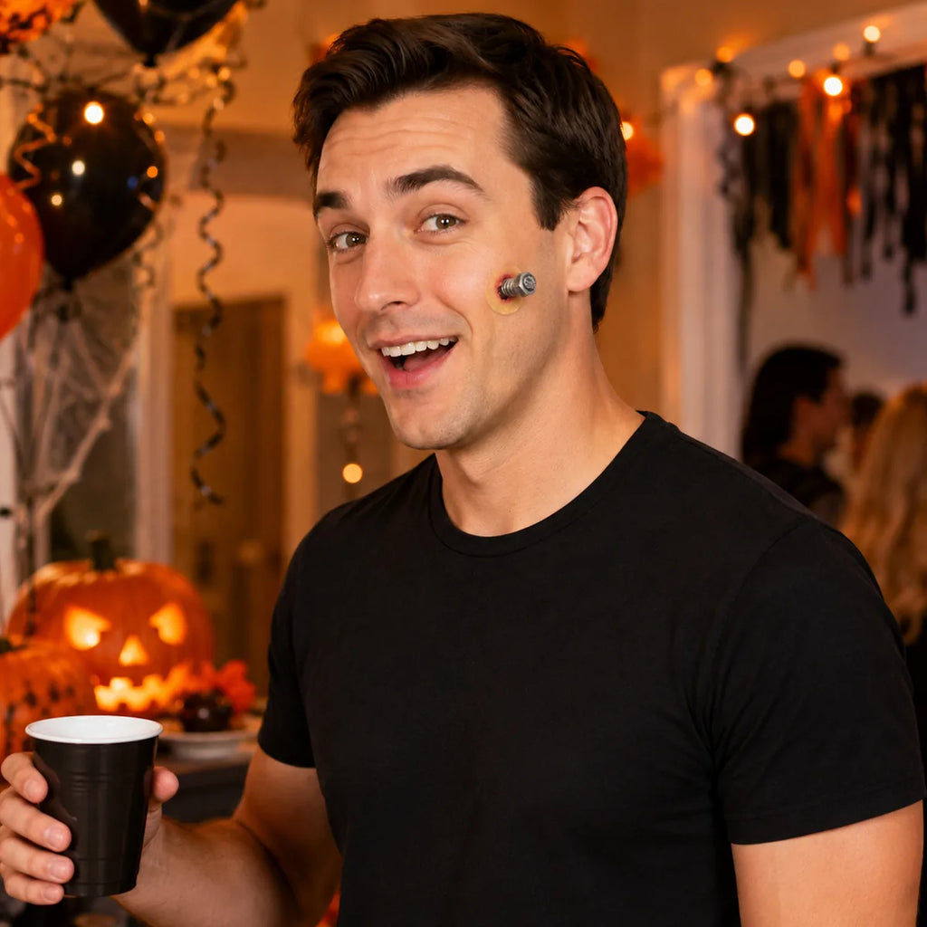 The latex screw prosthetic displayed in a styled Halloween scene for visual context.