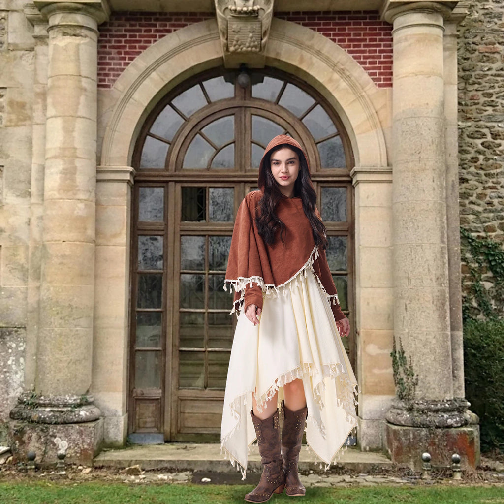 Women's brown and ivory medieval costume outside a historic stone building