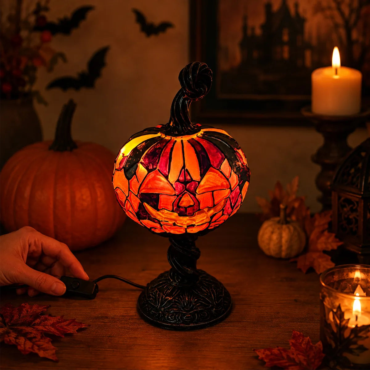 The mosaic pumpkin table lamp displayed in a styled Halloween scene for visual context.