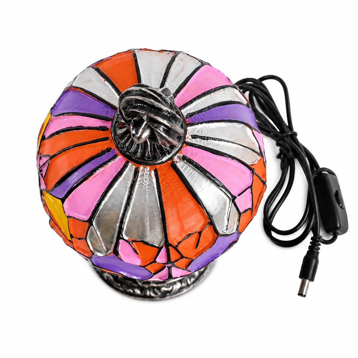 Side view of the mosaic pumpkin table lamp, showing its profile and visible construction details.