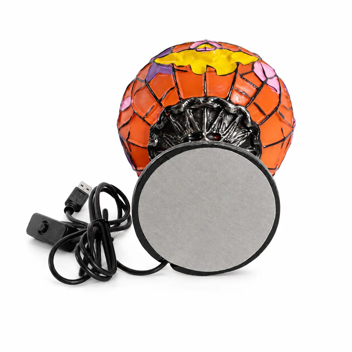 Multiple-angle view of the mosaic pumpkin table lamp, showing its shape from different sides.