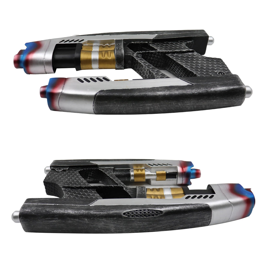 Non-firing sci-fi prop shown from multiple angles to highlight the twin barrels, black grip and silver and gold painted details.