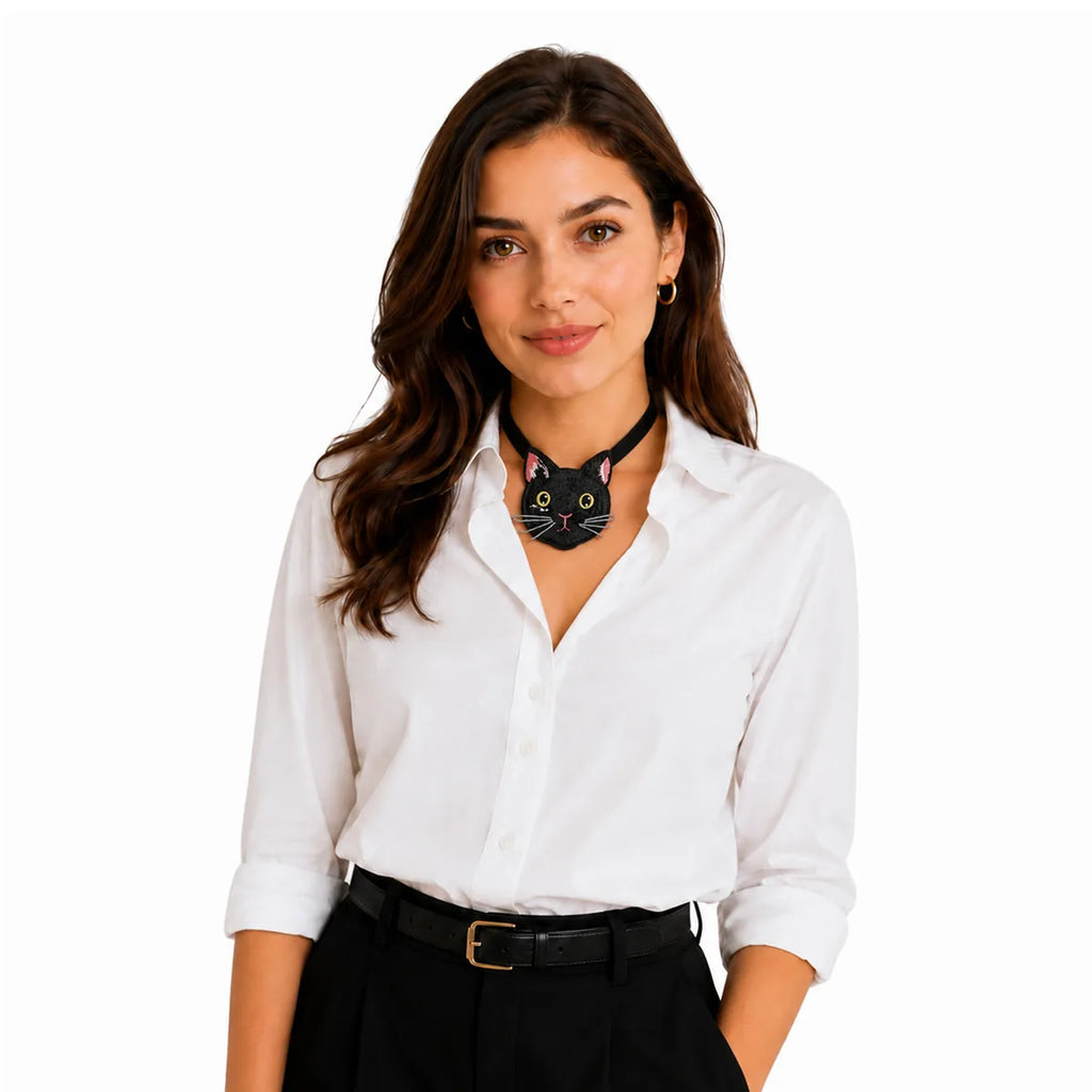 Front view of the owl embroidered necktie, showing its overall shape and visible design.