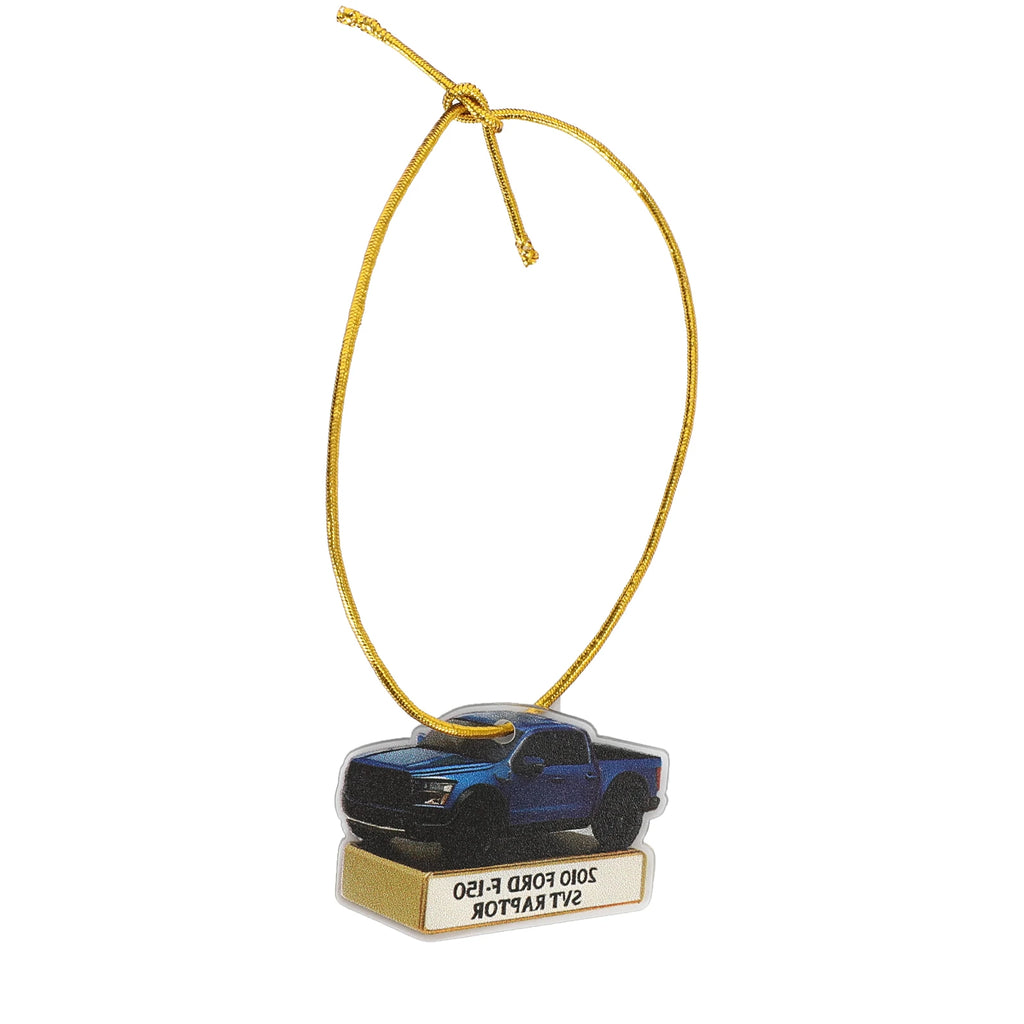 Blue Ford-inspired flat pickup truck ornament shown with its gold-colored hanging cord attached.