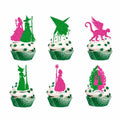 Pink and green glitter witch cupcake toppers with castle, monkey, broom, and fairy tale silhouettes for Halloween and themed party desserts.