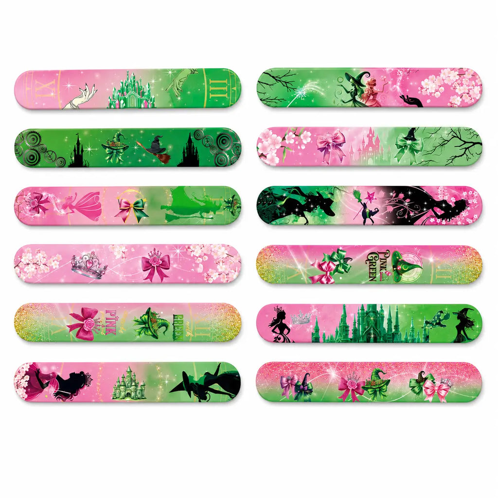 Set of pink and green witch and princess slap bracelets with castle, crown, bow, wand, flowers, and magical themed designs.