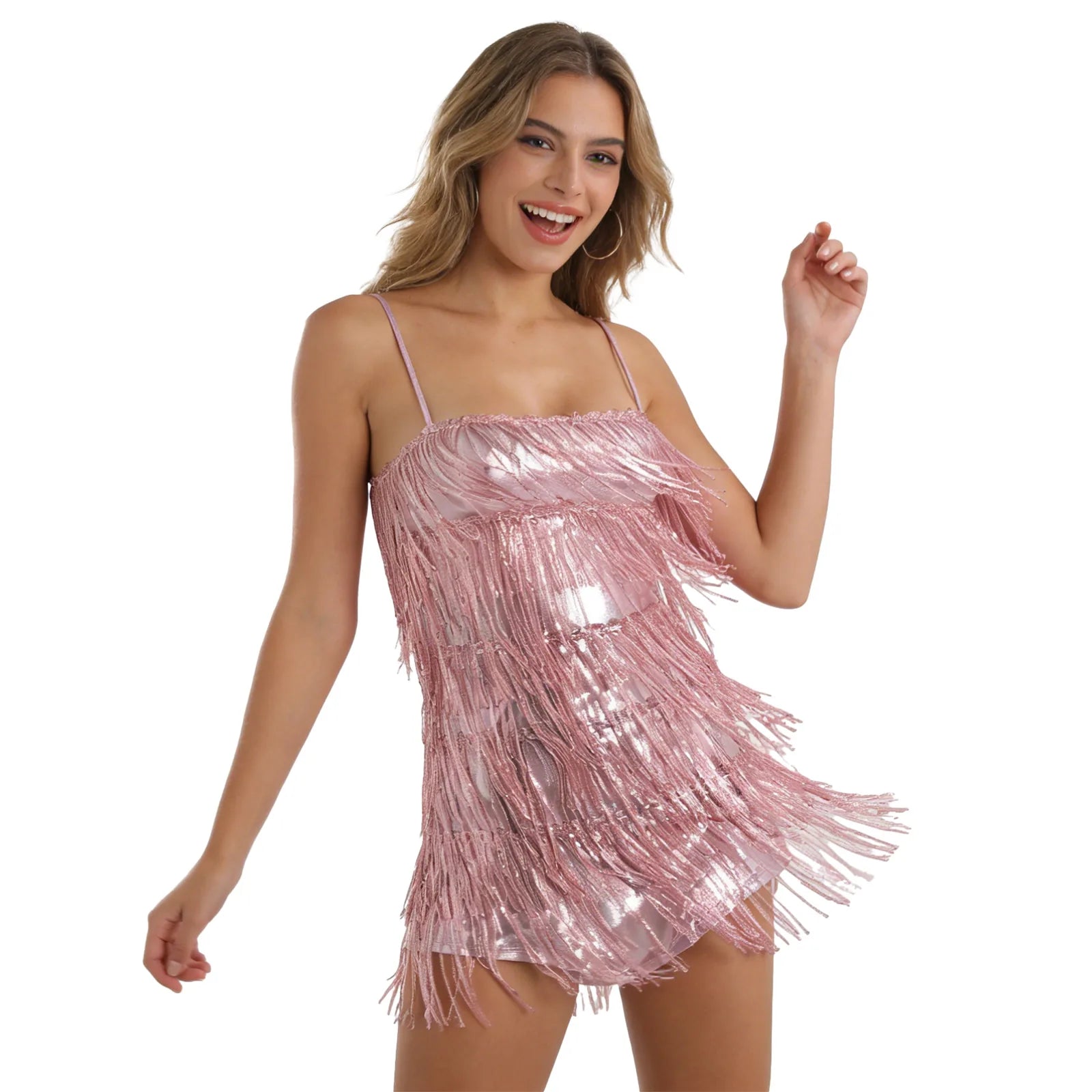 A woman models the pink sequin fringe cami mini dress from the front with her hands on her hips against a white background.