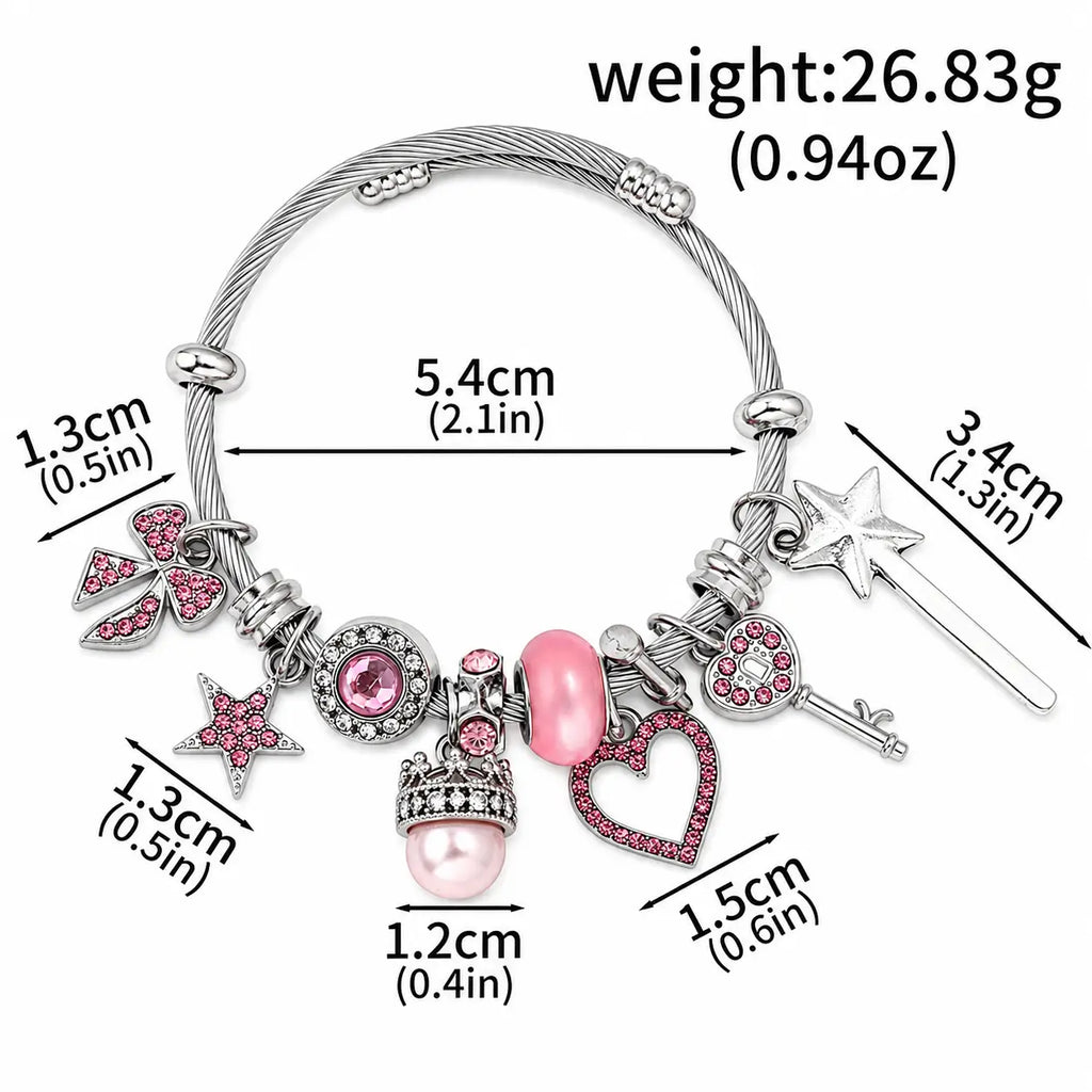 Pink and silver charm bracelet with heart, star, crown, bow, key, and magic wand charms shown with size and weight details.