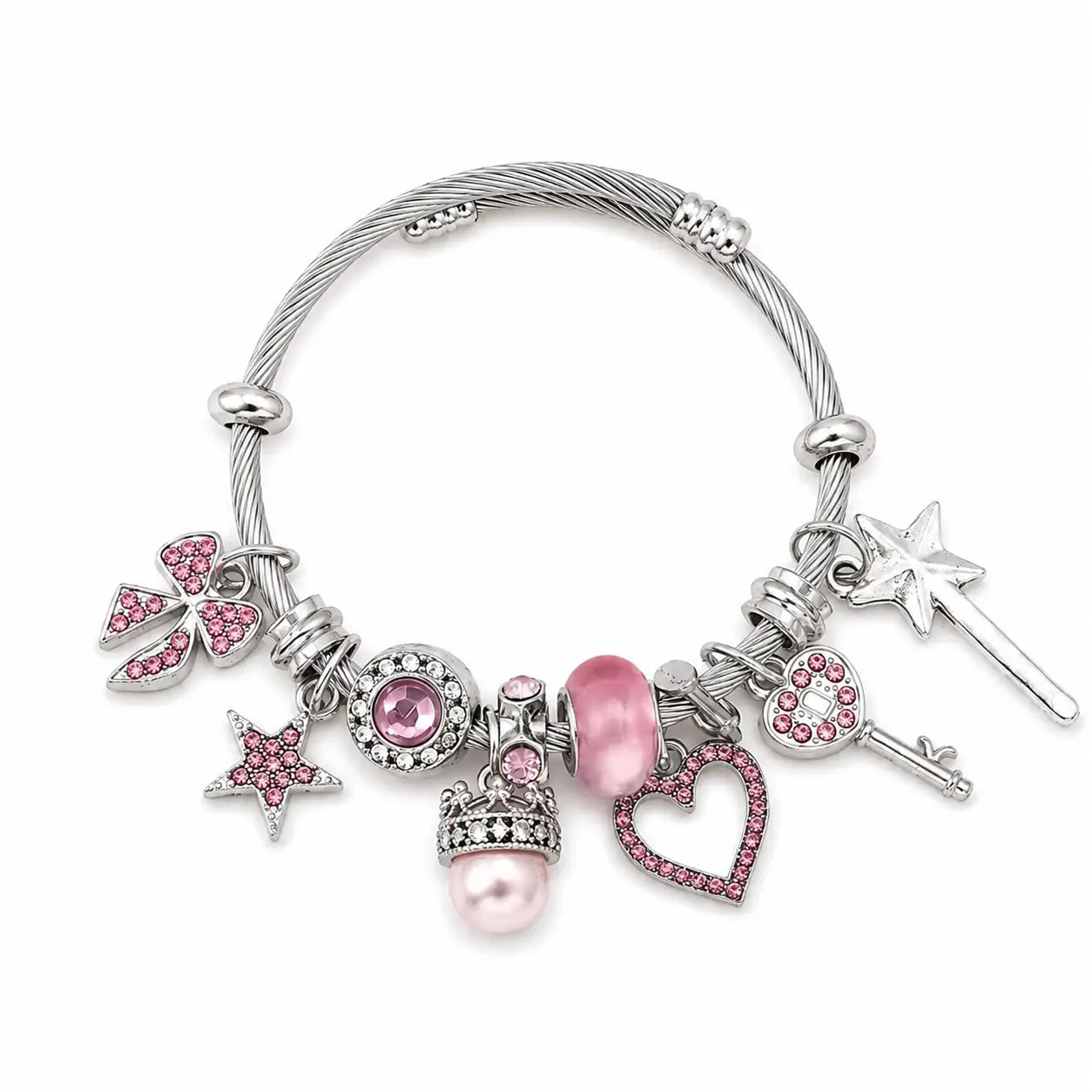 Pink and silver charm bracelet with heart, star, bow, key, wand, crown, pearl, and pink rhinestone charms on a white background.