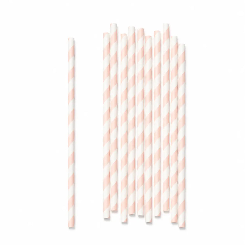 Pink and white striped paper straws arranged on a clean white background.