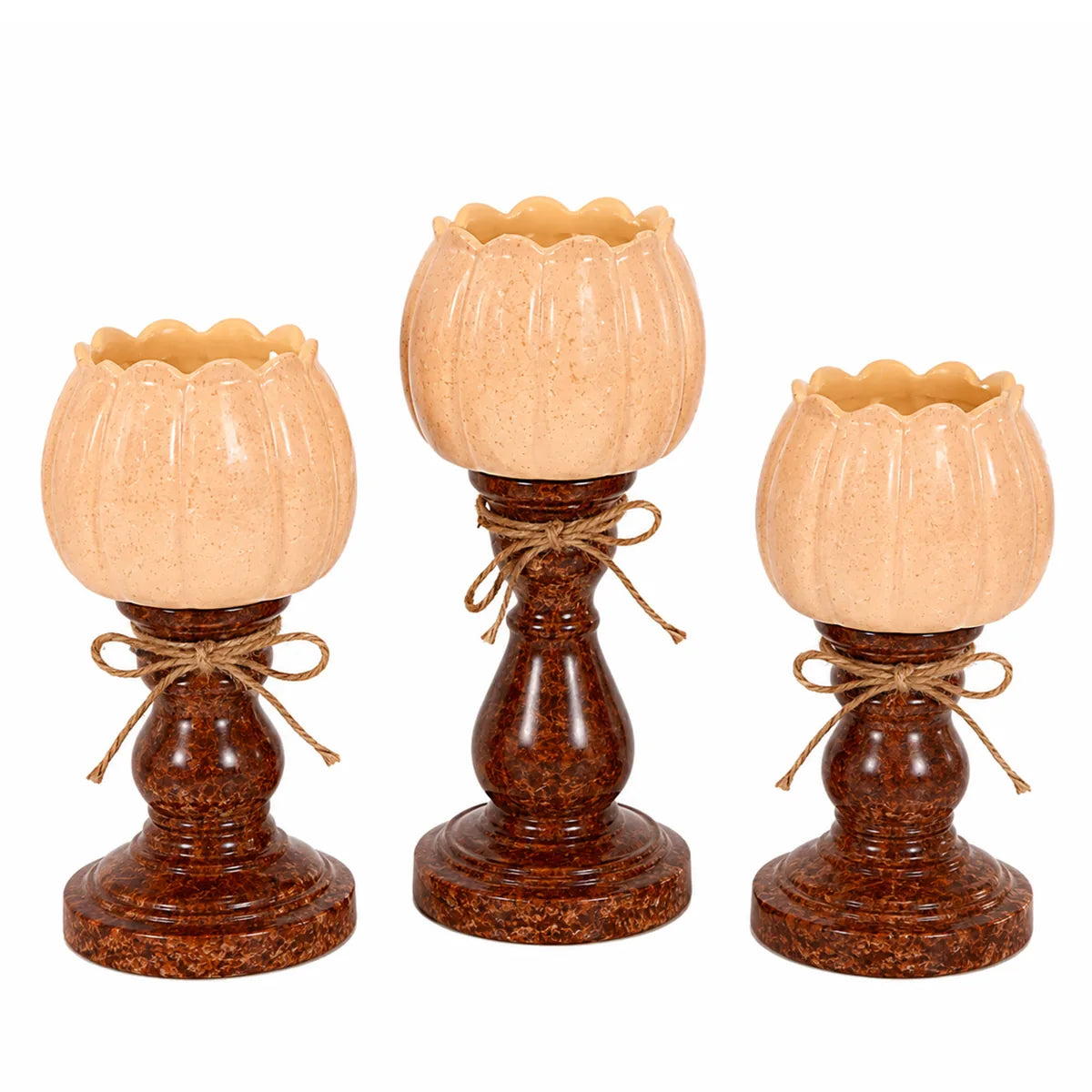 Back view of the pumpkin candle holder set, showing the rear shape and visible construction.