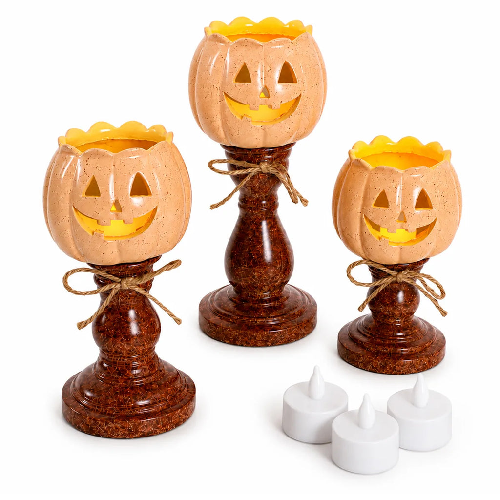 Styled view of the pumpkin candle holder set, showing how the item appears in use.