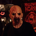 Model wearing the Bloody Demon Full-Head Mask in a Halloween costume setting