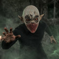 Model wearing the Gray Mouthless Alien Mask in a Halloween costume setting