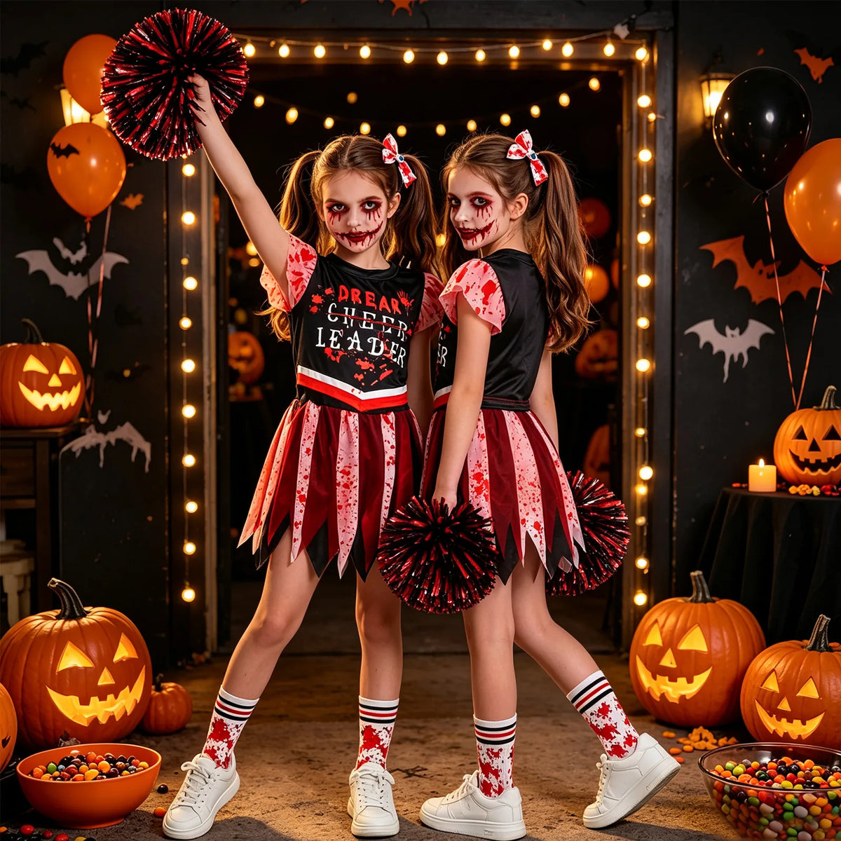 Two models wear the outfit with eyeball hair clips at a pumpkin-decorated Halloween party.