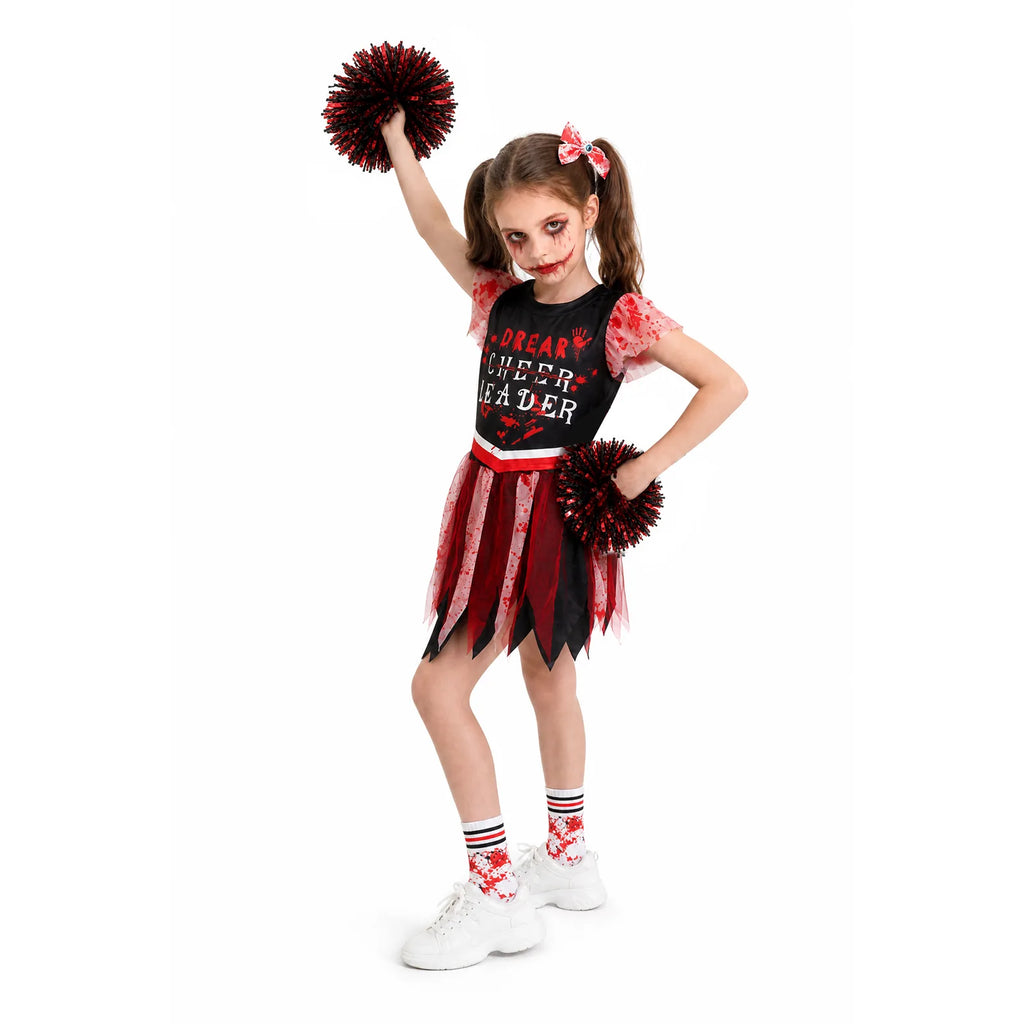 A girl raises one pom-pom while showing the ruffled sleeves and pointed skirt panels.