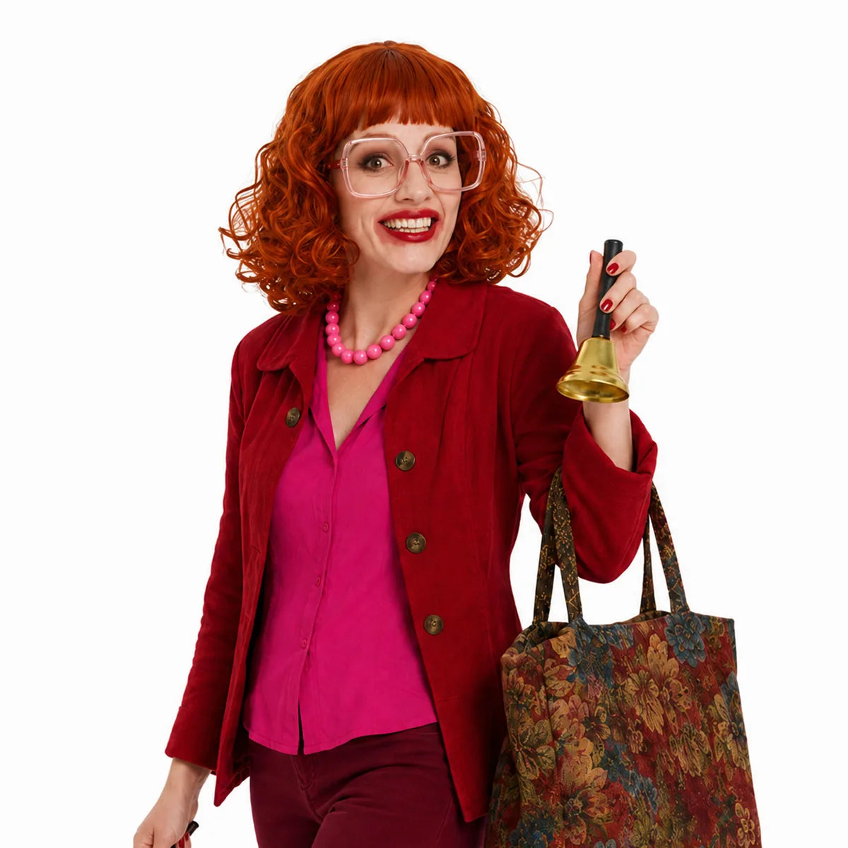 Woman holds the included bell while wearing the red wig and pink accessories.