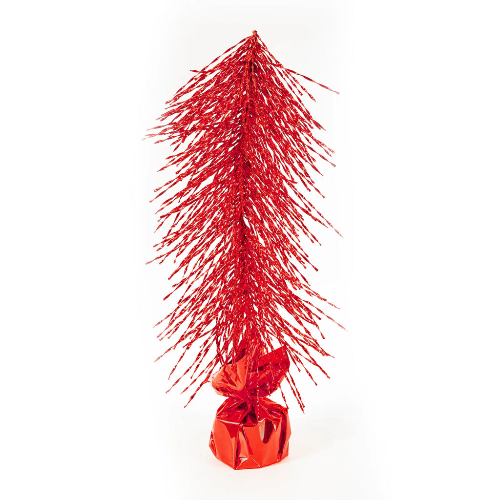 The red tabletop Christmas tree stands upright with narrow spreading branches on white.