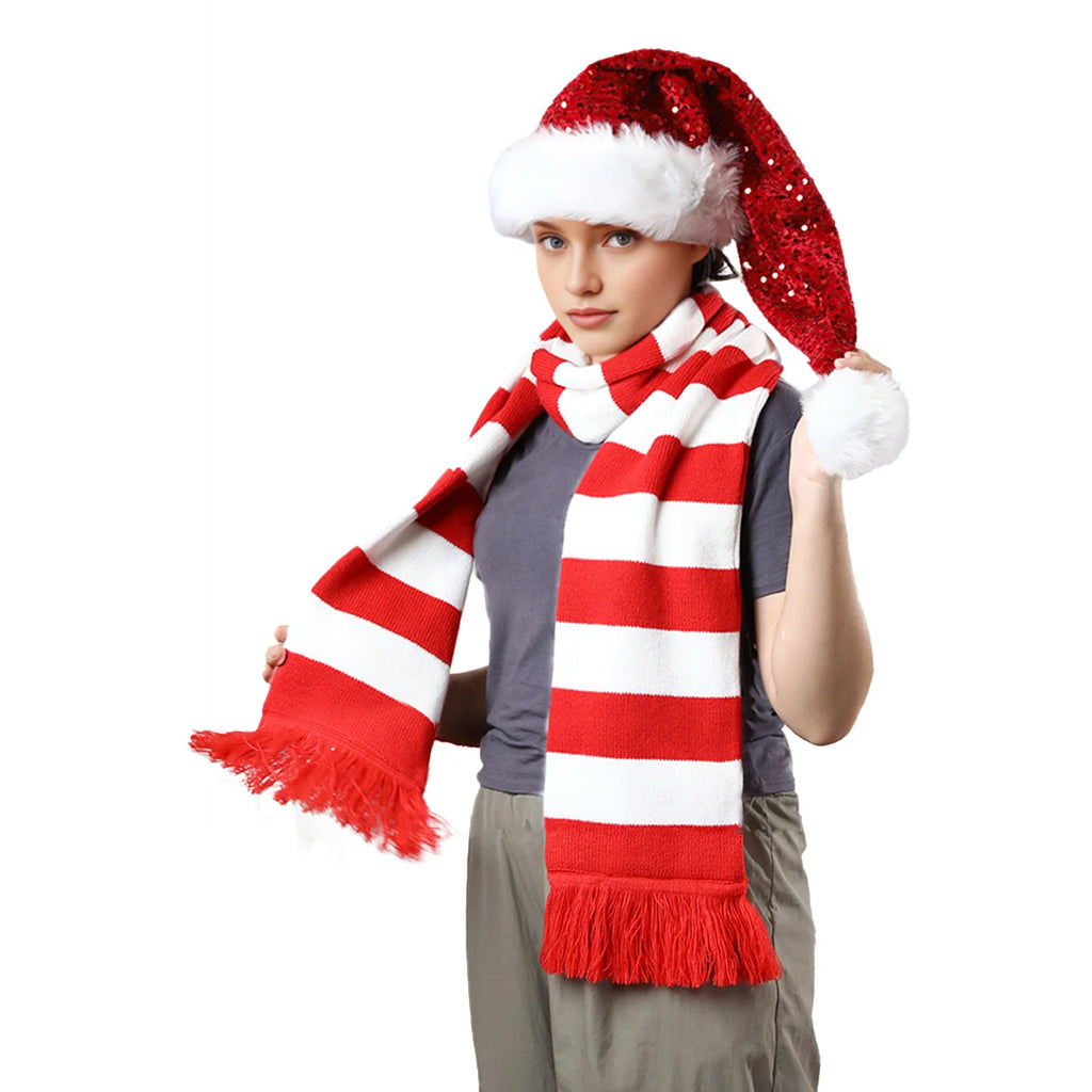 Model in a red hat wears the striped scarf on white.
