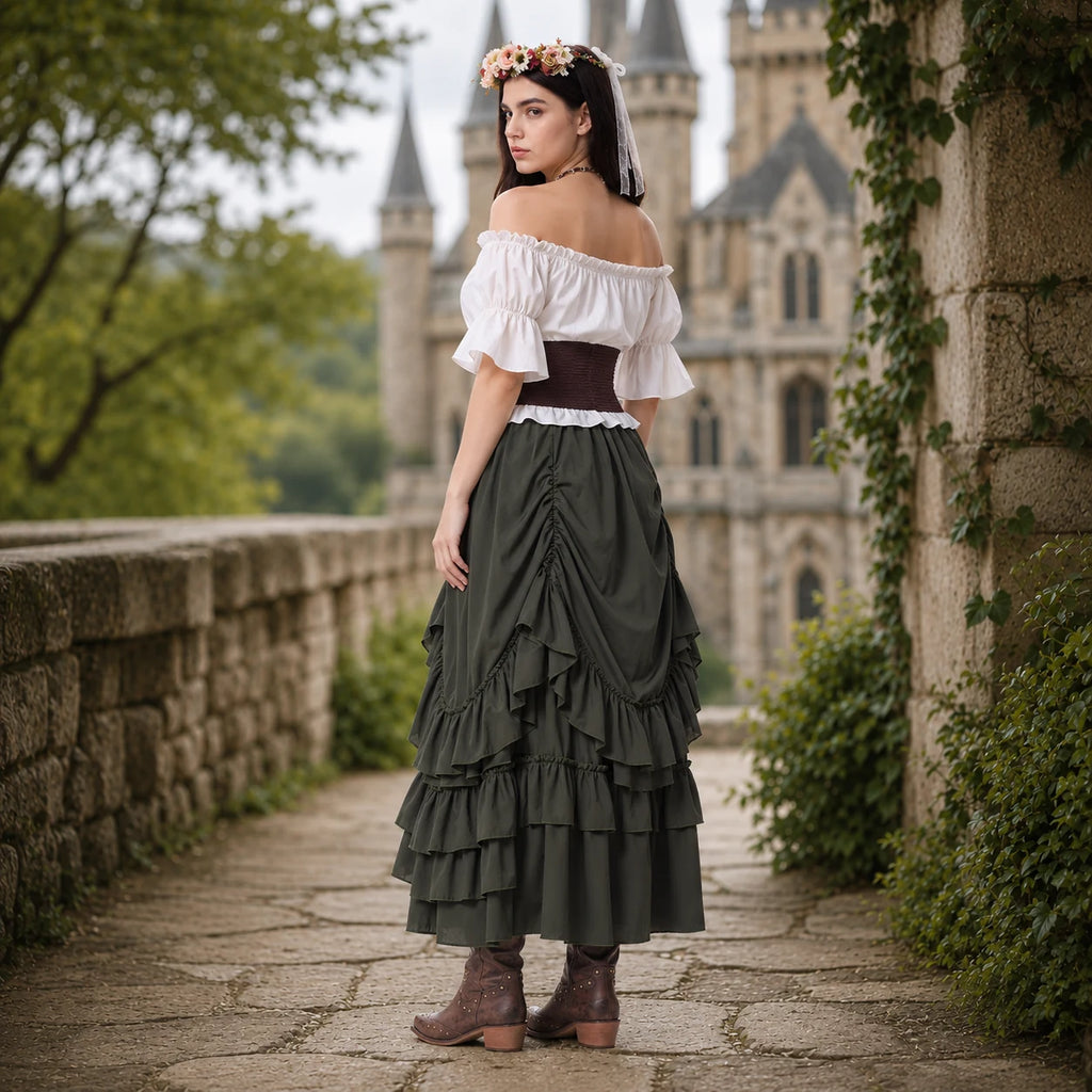Back view of a woman's olive green Renaissance peasant outfit in a castle garden