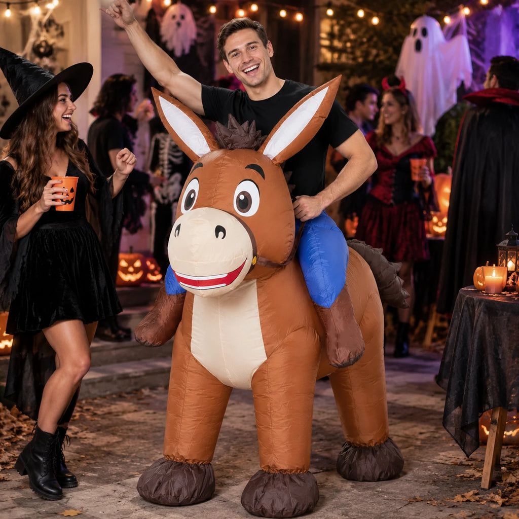 An adult wears the inflatable donkey costume outdoors during a colorful street carnival.