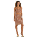 A woman models the rose gold sequin crop top and skirt set from the front against a white background, showing its overall silhouette.