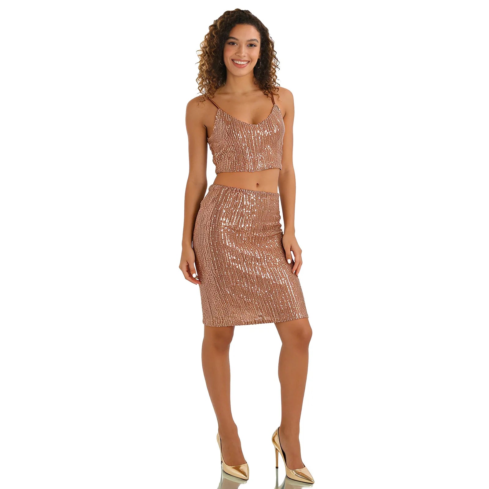 A woman models the rose gold sequin crop top and skirt set from the front against a white background, showing its overall silhouette.