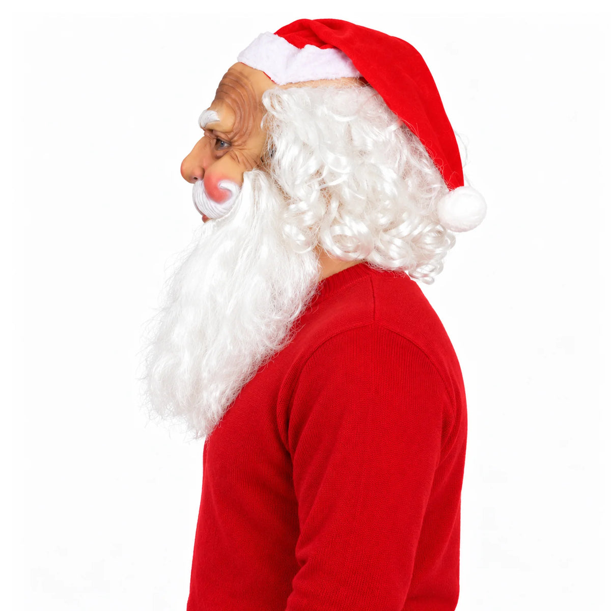 Side view of Santa mask with white curls, beard and red hat.