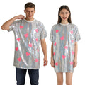 Adults wearing the silver sequin heart shirt with pink heart motifs
