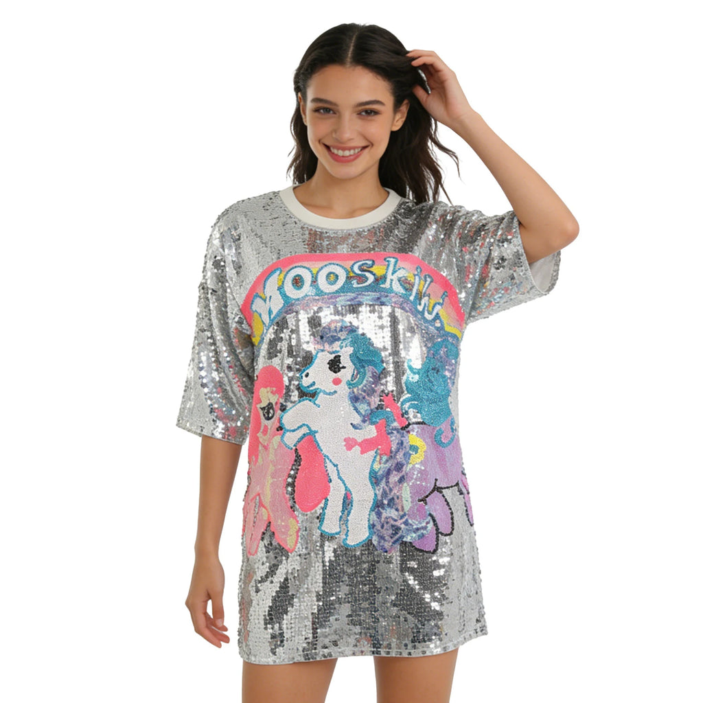 A model wears the silver sequin pony T-shirt dress in side profile against a white background to show its fitted silhouette.